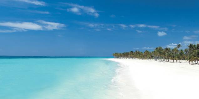 Quilômetros de areia branca, águas transparentes, fileiras de coqueiros e sol o ano inteiro fazem de Punta Cana um destino dos sonhos Quilômetros de areia branca, águas transparentes, fileiras de coqueiros e sol o ano inteiro fazem de Punta Cana um destino dos sonhos